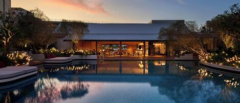 Outdoor pool, open 7:00 AM to 9:00 PM, pool umbrellas, pool loungers