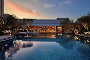 Outdoor pool, open 7:00 AM to 9:00 PM, pool umbrellas, pool loungers