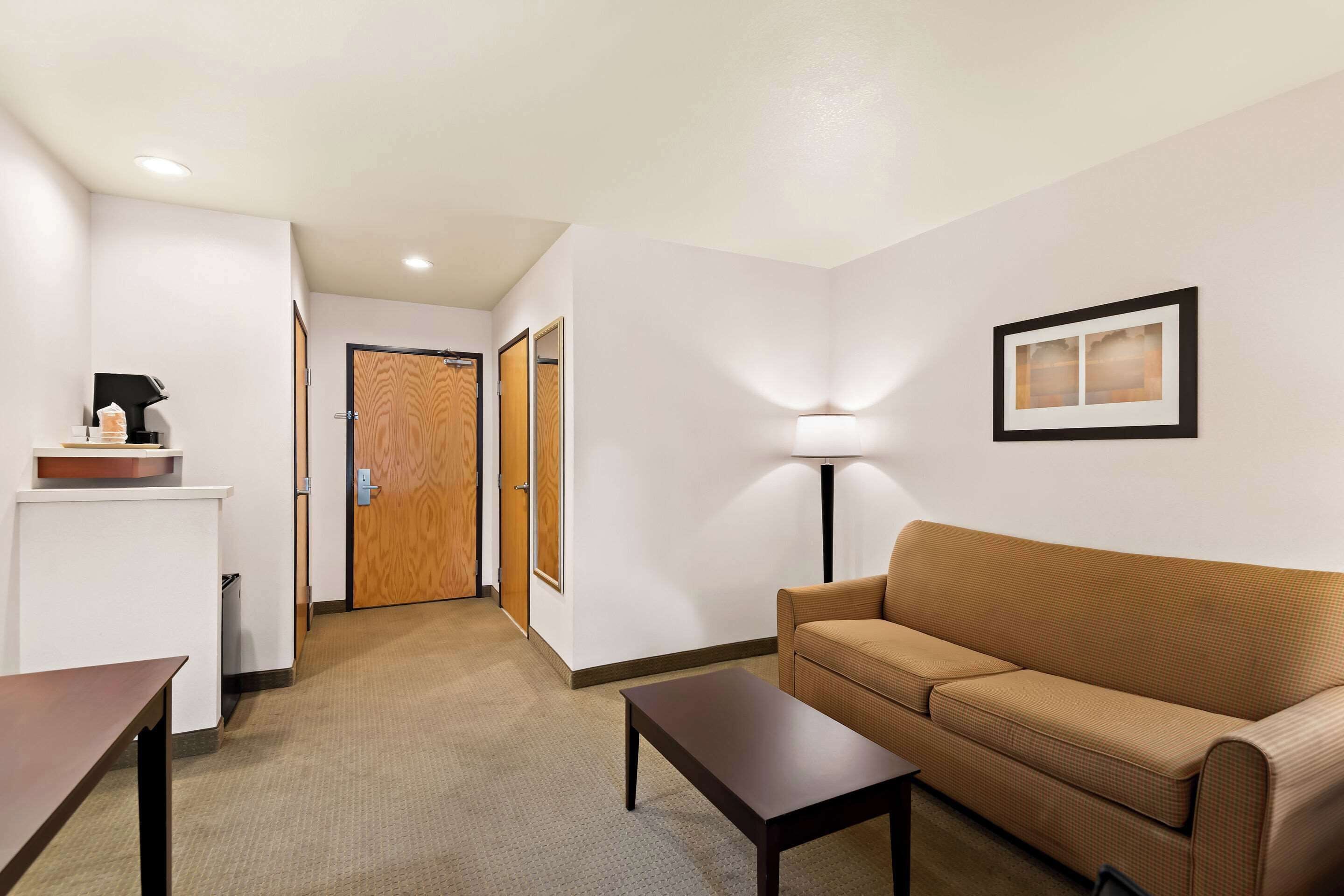 suite, 1 king bed, non smoking | desk, laptop workspace, blackout curtains, iron/ironing board