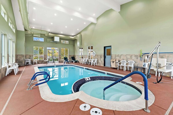 Indoor pool, open 9:00 AM to 10:00 PM, pool loungers