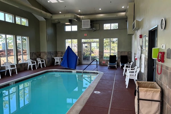 Indoor pool, open 9:00 AM to 10:00 PM, pool loungers