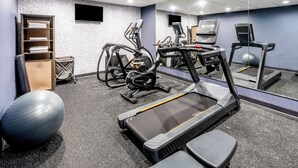 A gym with treadmills, elliptical machines, and exercise balls. - Garner Hotel Doswell Southeast by IHG (Doswell)