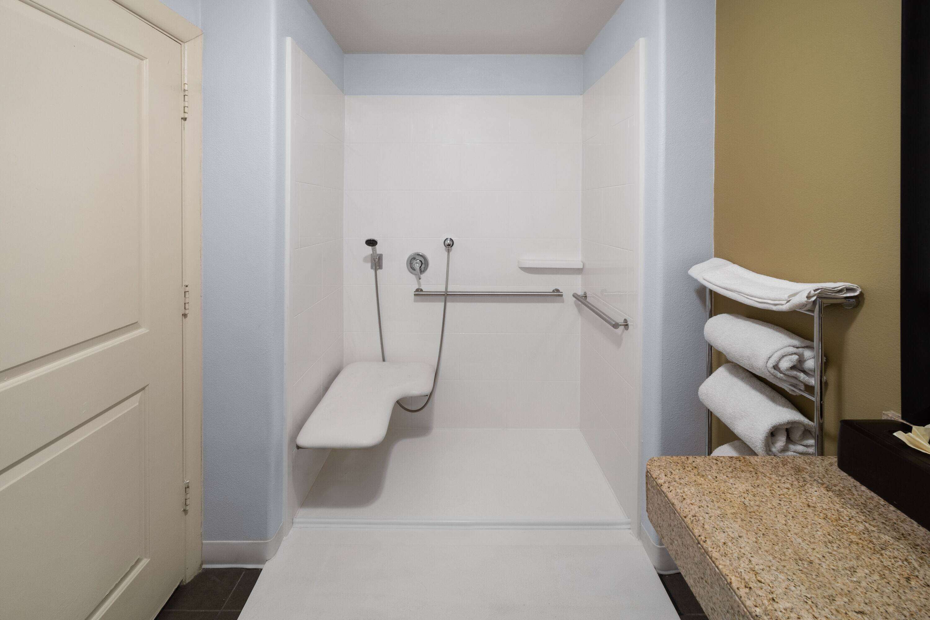 room, 1 king bed, accessible, non smoking (mobility/hearing, roll-in shower) | accessible bathroom