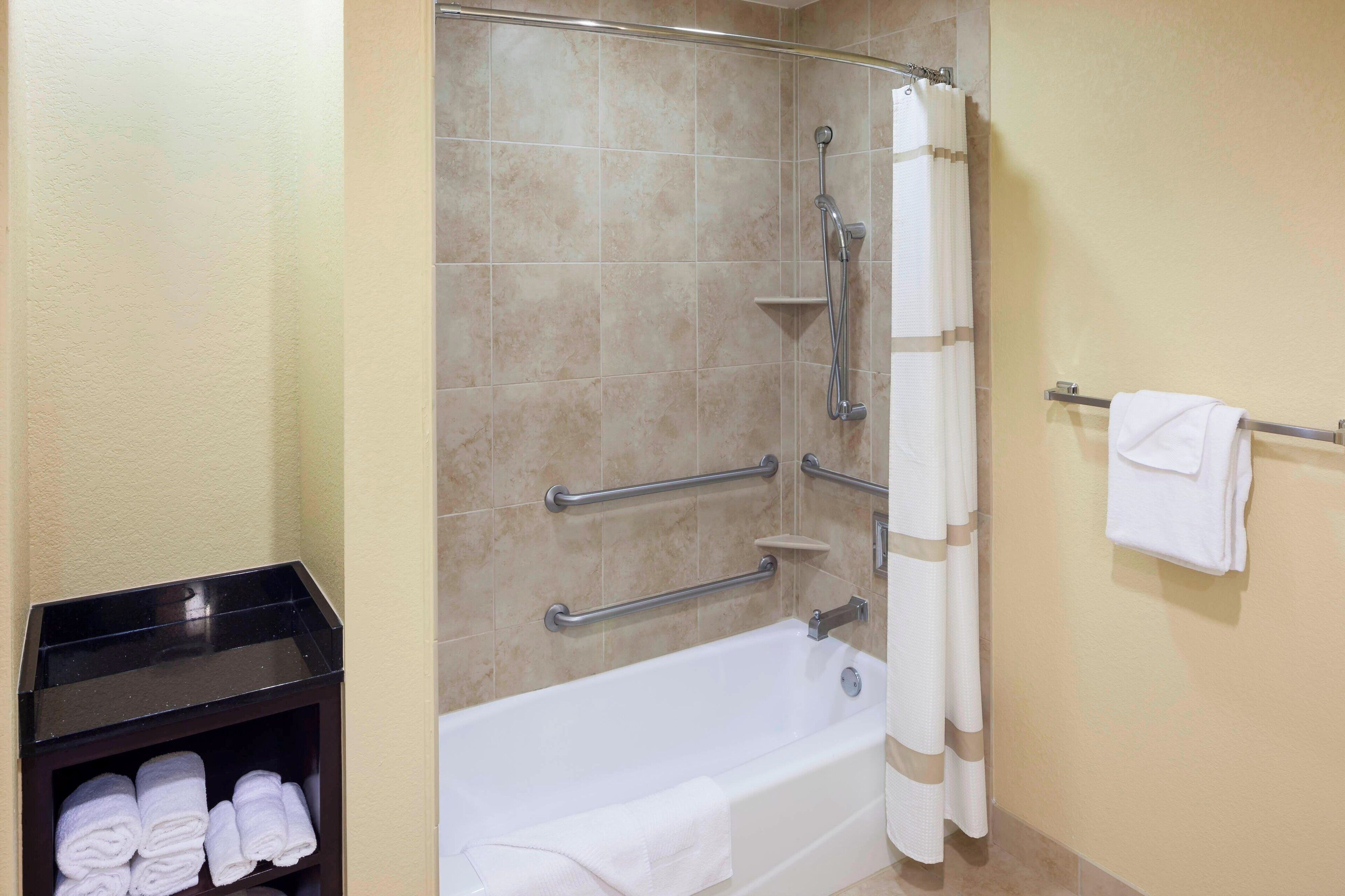 combined shower/bathtub, free toiletries, hair dryer, towels
