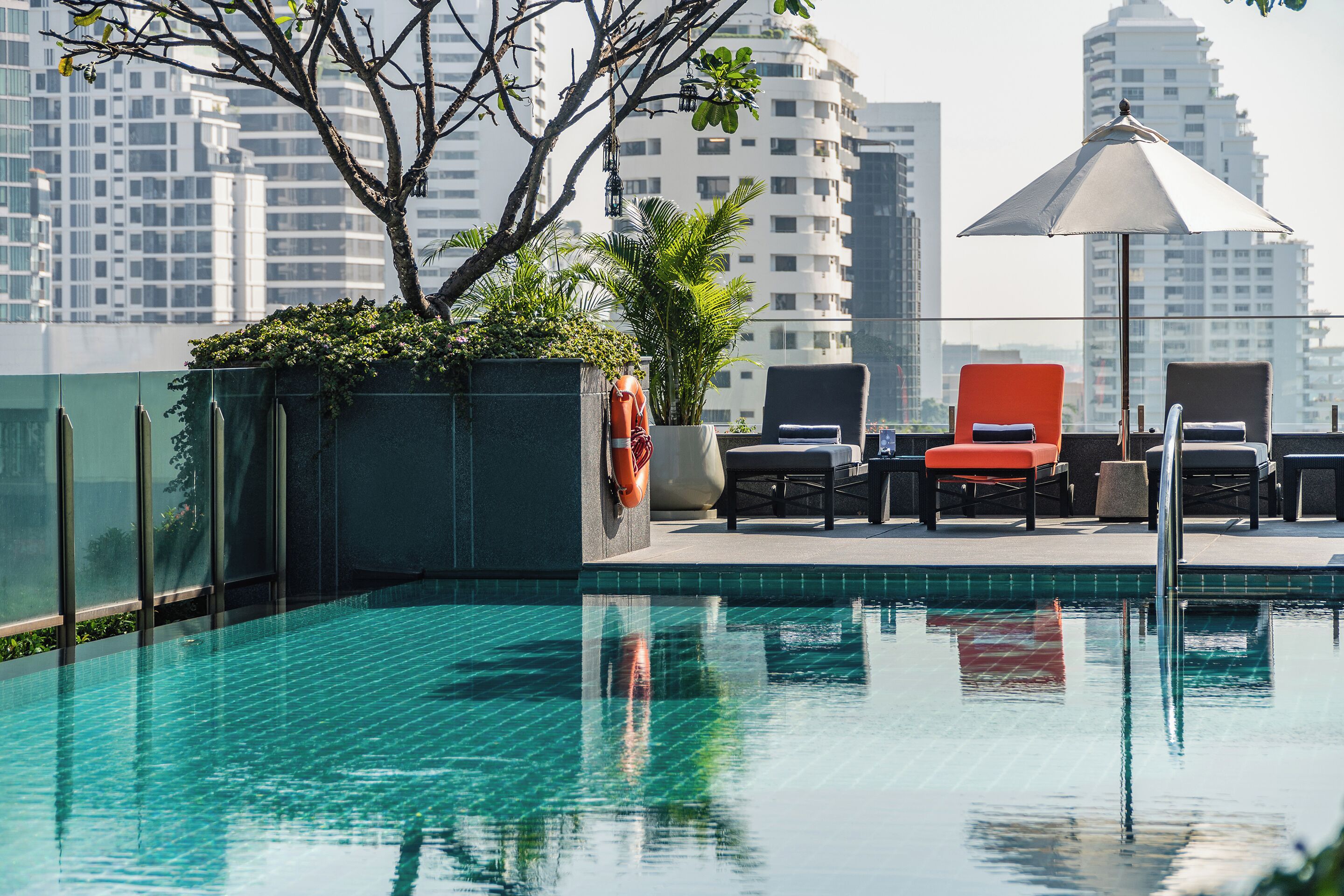 Outdoor pool, open 6:00 AM to 8:00 PM, pool umbrellas, sun loungers