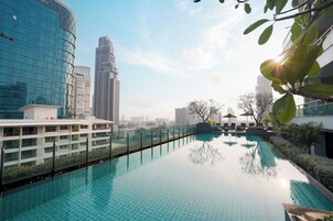 Outdoor pool, open 6:00 AM to 8:00 PM, pool umbrellas, sun loungers