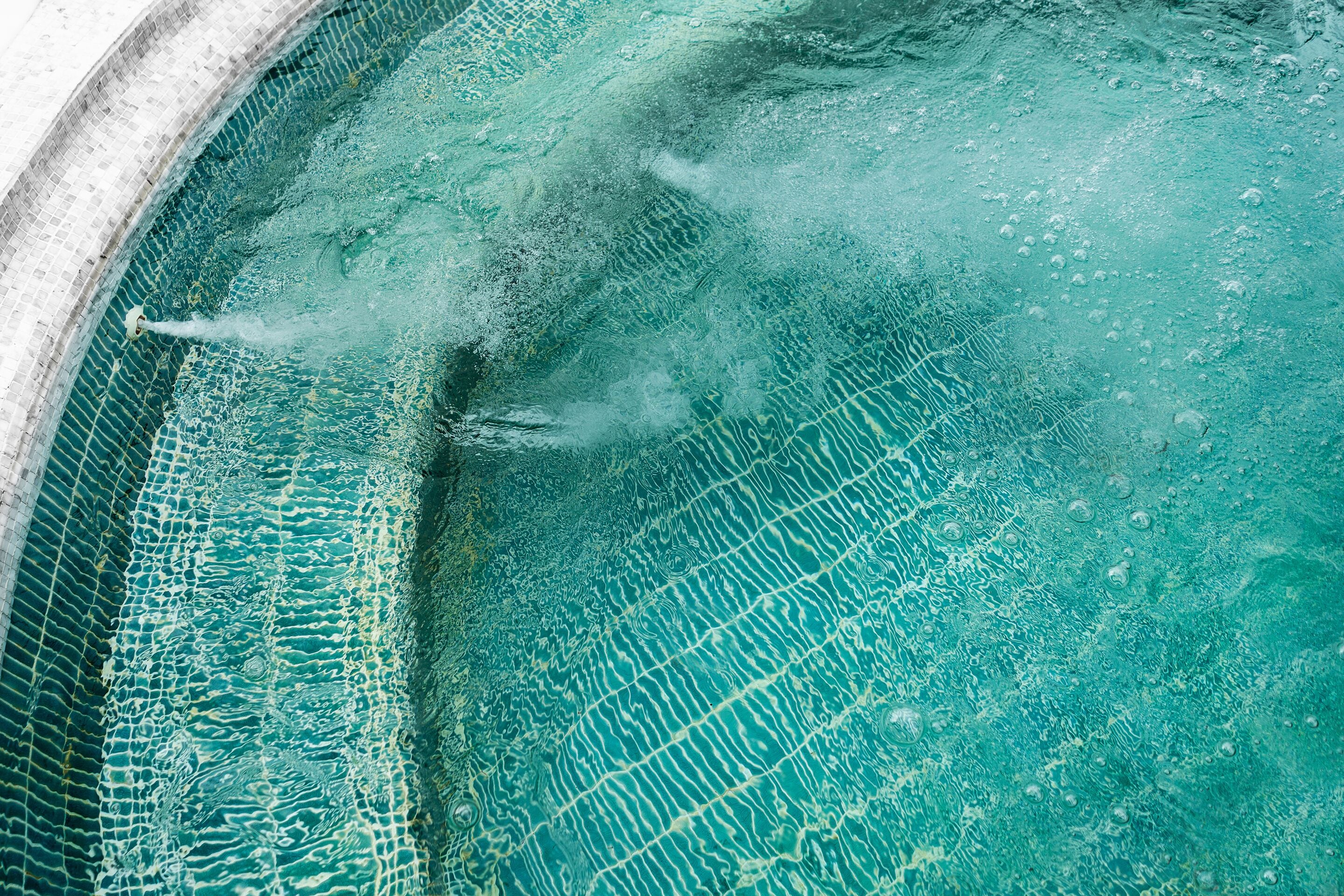 outdoor pool, open 6:00 am to 8:00 pm, pool umbrellas, pool loungers