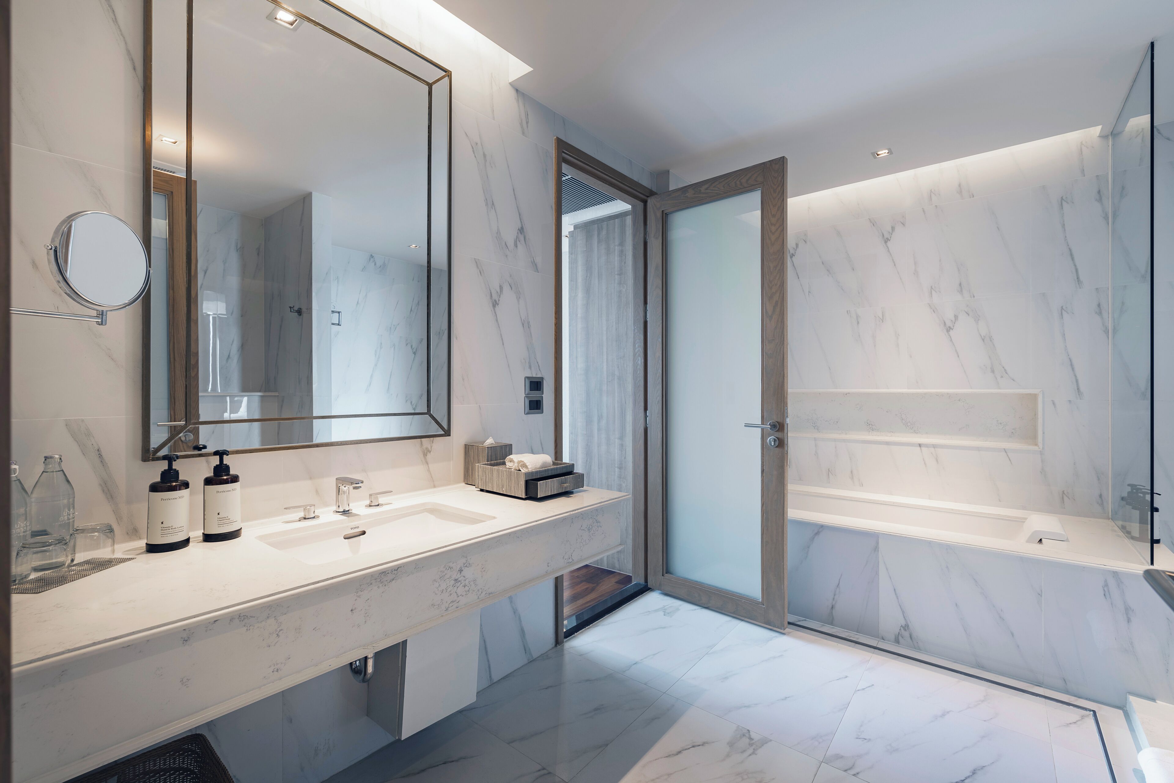 junior suite king with balcony | bathroom | free toiletries, hair dryer, bathrobes, slippers