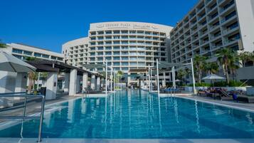 Outdoor pool, open 7:00 AM to 8:00 PM, pool umbrellas, sun loungers