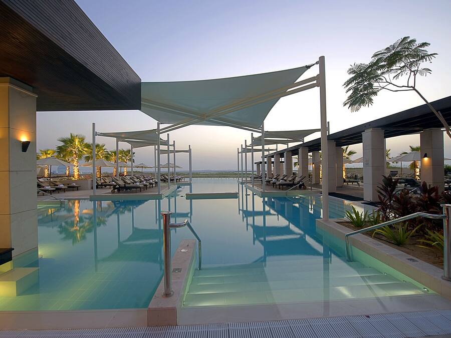 Outdoor pool, open 7:00 AM to 8:00 PM, pool umbrellas, sun loungers