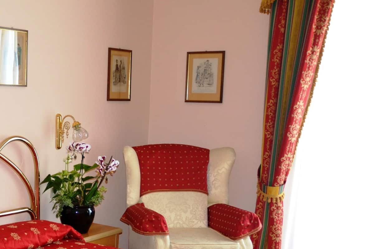 Triple Room, Lake View | In-room safe, individually decorated, individually furnished, desk