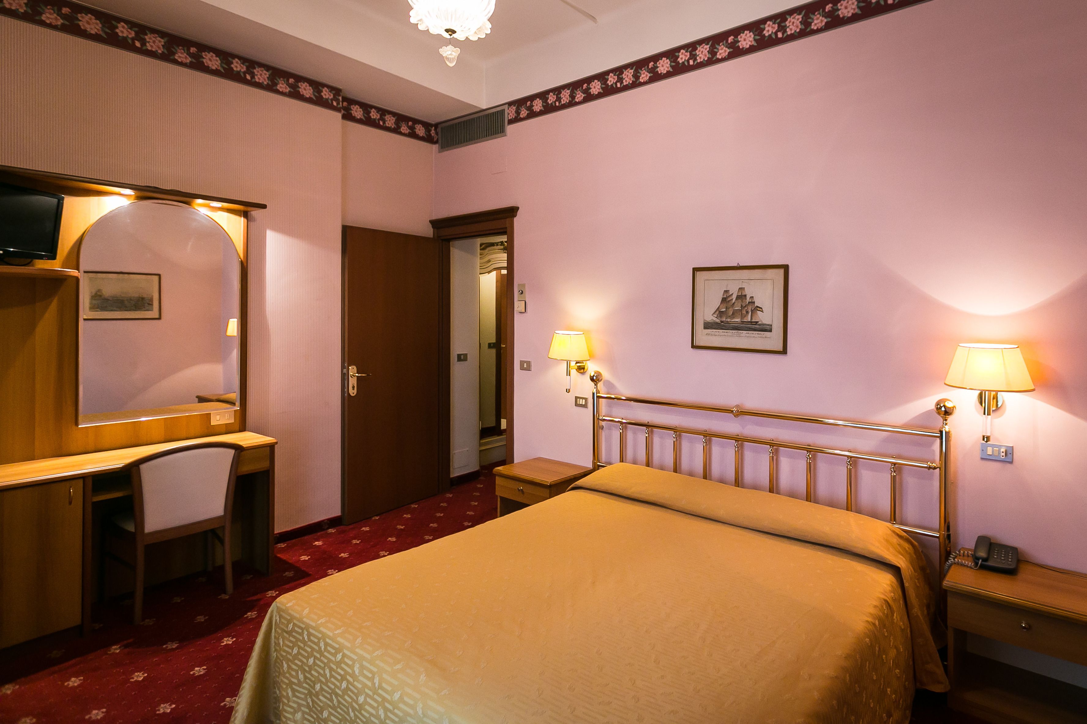 triple room, lake view | 1 bedroom, in-room safe, individually decorated, individually furnished