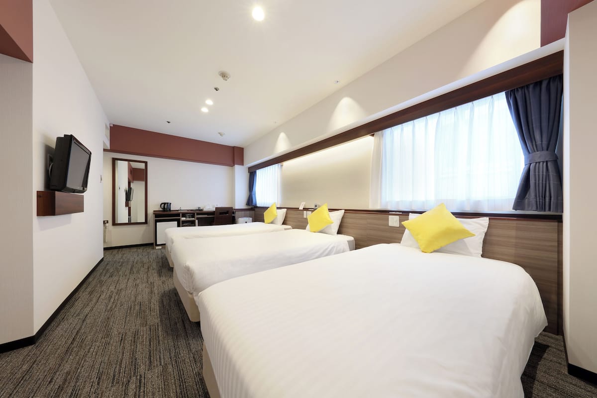 Standard Triple Room, Non Smoking | Memory-foam beds, desk, blackout curtains, iron/ironing board