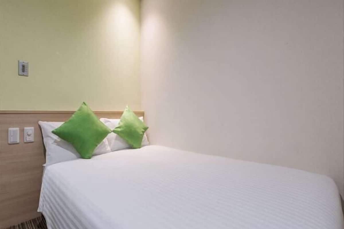 Memory-foam beds, desk, blackout curtains, iron/ironing board
