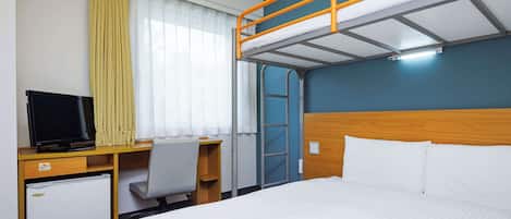Down duvets, desk, laptop workspace, blackout curtains