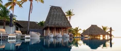 Outdoor pool, pool umbrellas, sun loungers