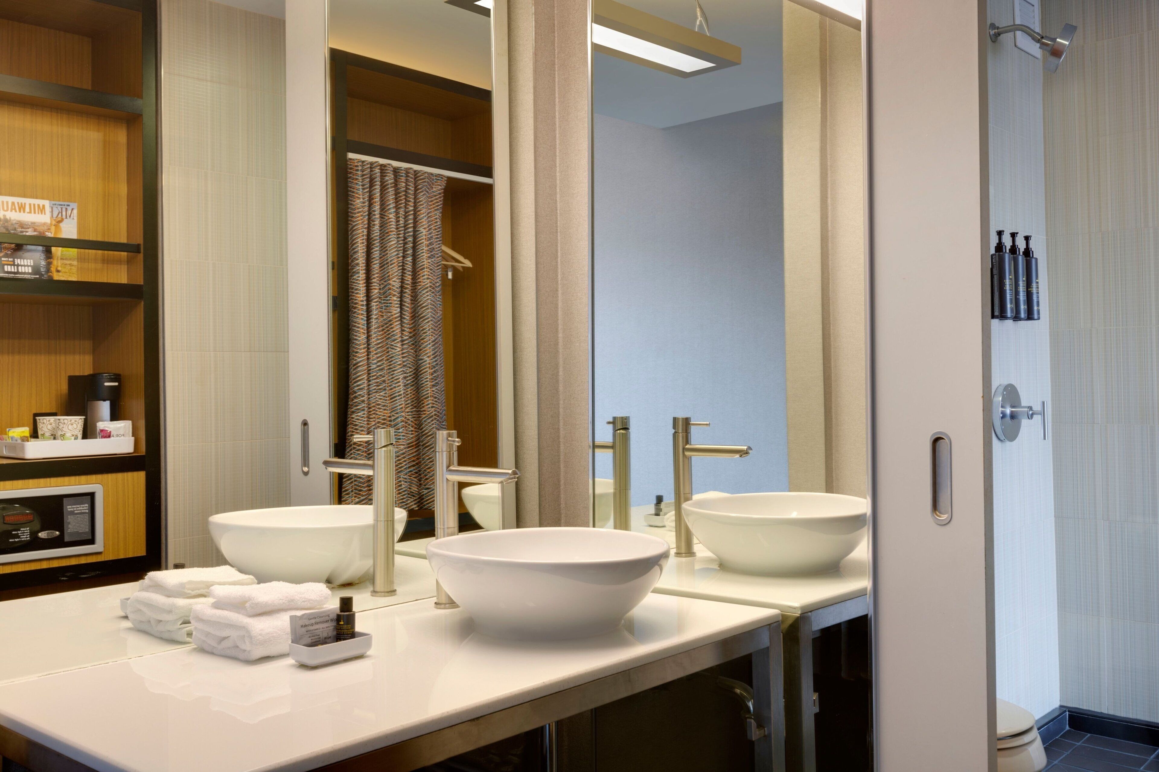 shower, free toiletries, hair dryer, towels