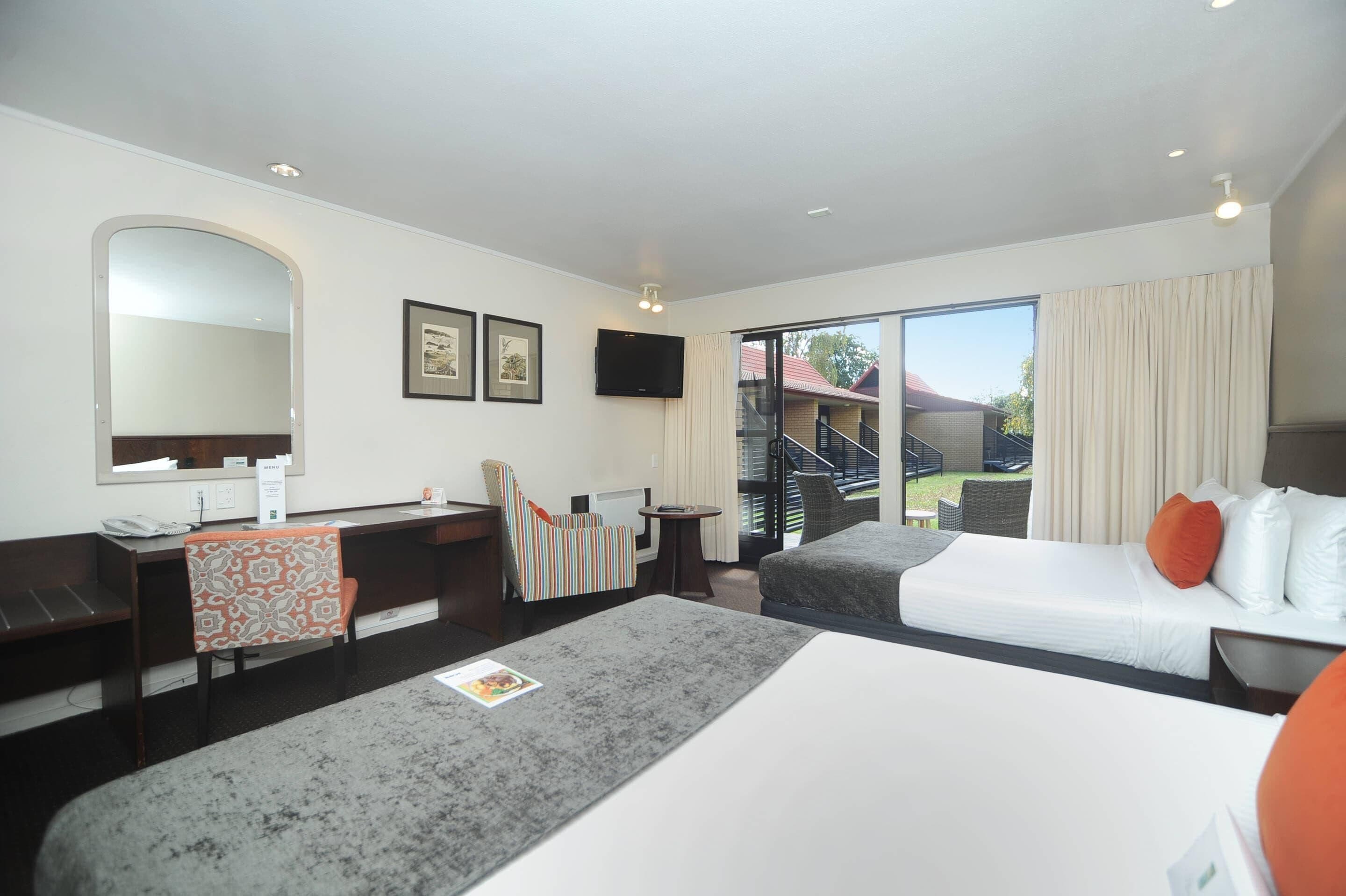 Deluxe Room, 2 Queen Beds, Non Smoking | Premium bedding, desk, laptop workspace, blackout drapes