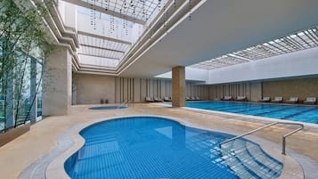 Indoor pool, open 6:00 AM to 10:00 PM, pool loungers