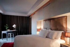 Premium bedding, pillow-top beds, minibar, in-room safe