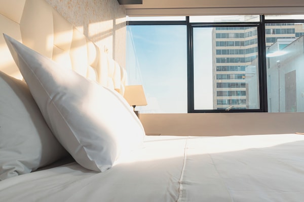 Junior Double Room, Partial Ocean View | 1 bedroom, Egyptian cotton sheets, premium bedding, down comforters