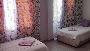 Camas com colchões pillow-top, roupa de cama