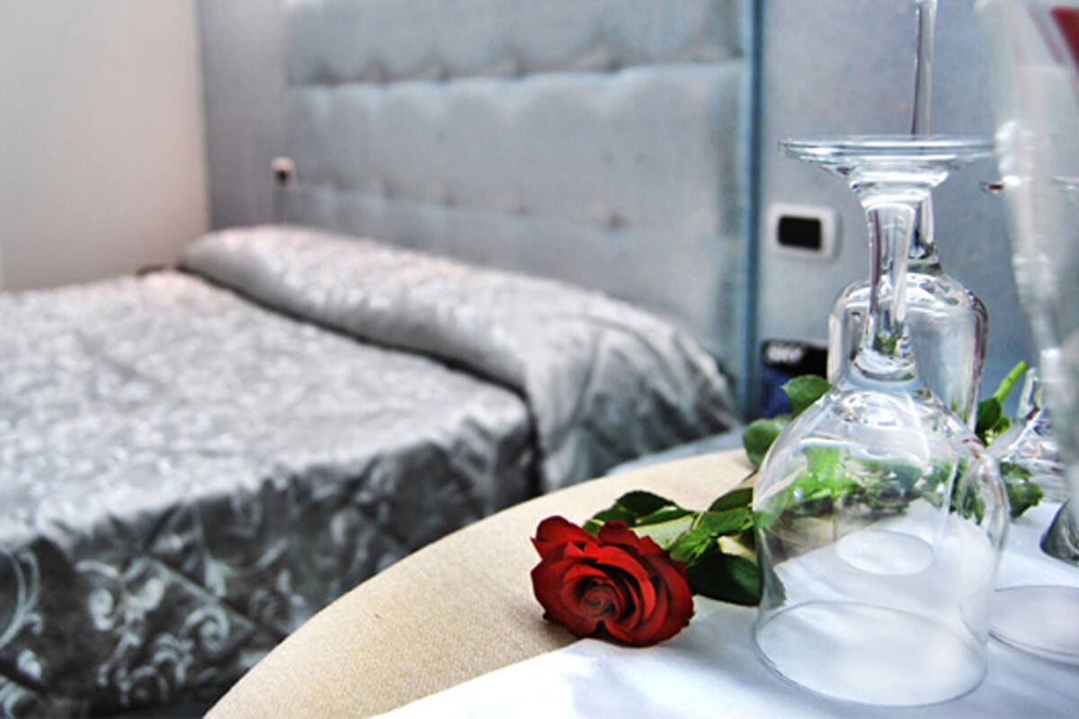 Premium bedding, down comforters, minibar, in-room safe
