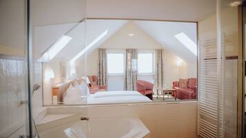 Suite | Bathroom | Rainfall showerhead, free toiletries, hair dryer, bathrobes