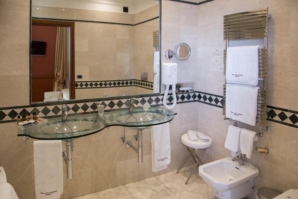 free toiletries, hair dryer, slippers, bidet