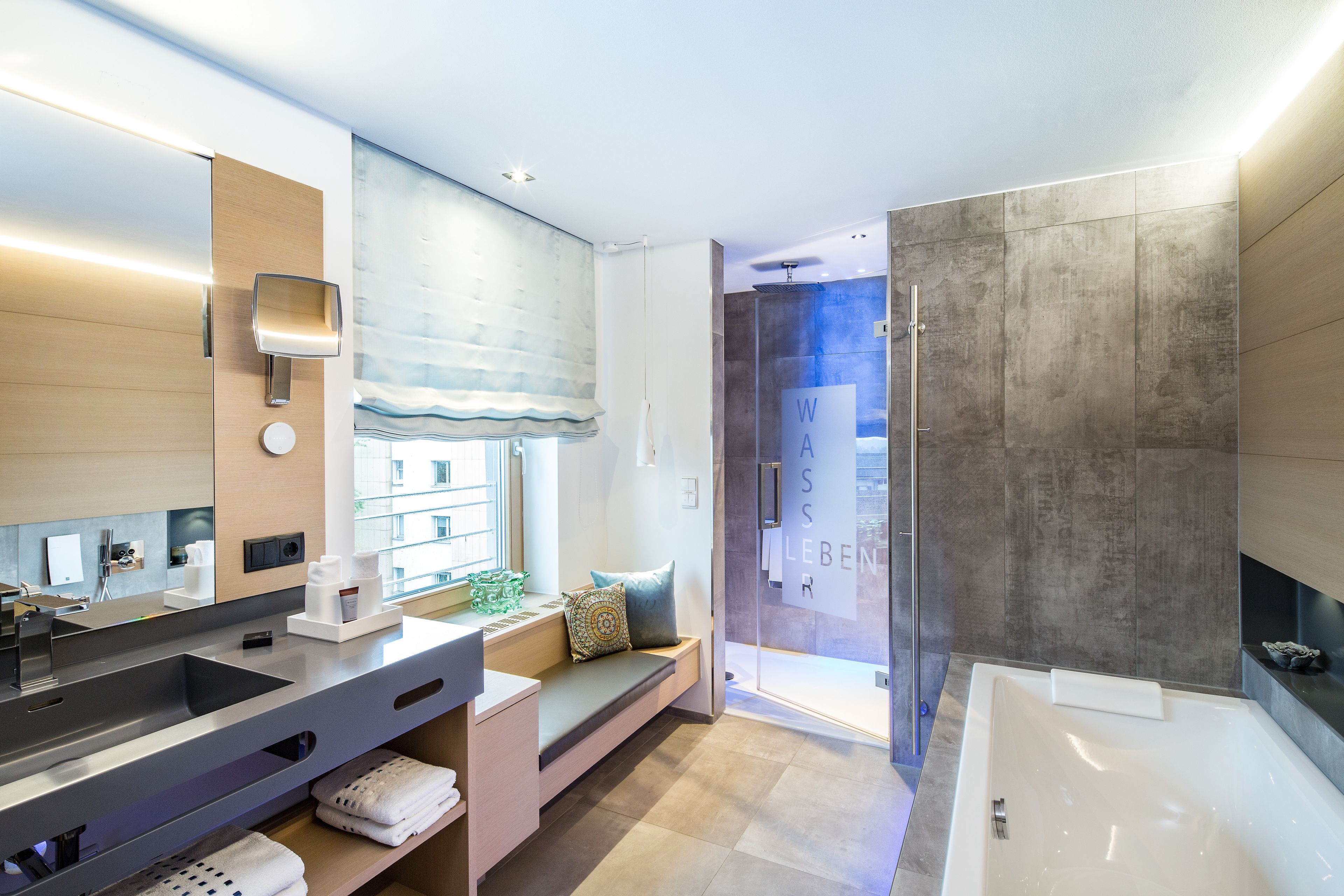 junior suite, fireplace (chimney lounge) | bathroom | deep-soaking bathtub, rainfall showerhead, free toiletries, hair dryer