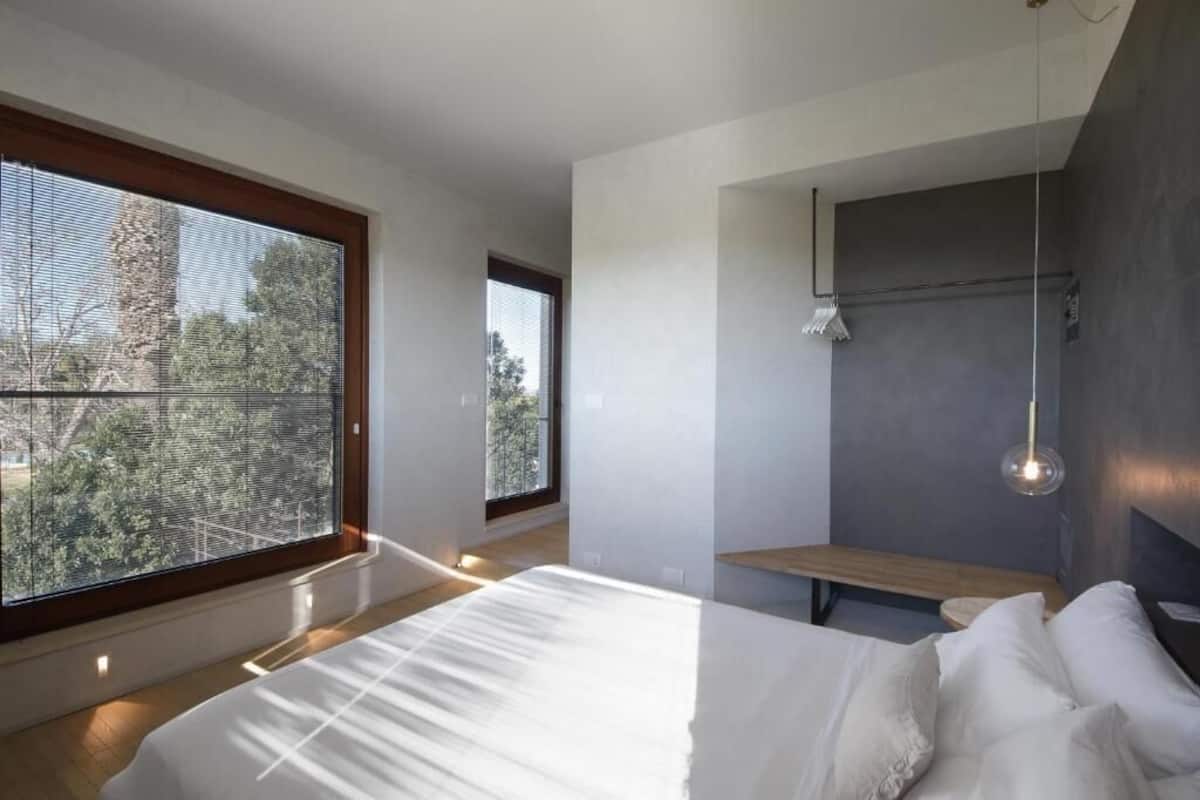 Suite panorámica, vistas al jardín | 1 dormitorio, escritorio, wifi gratis y ropa de cama
