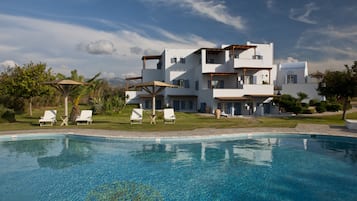 Outdoor pool, pool umbrellas, pool loungers