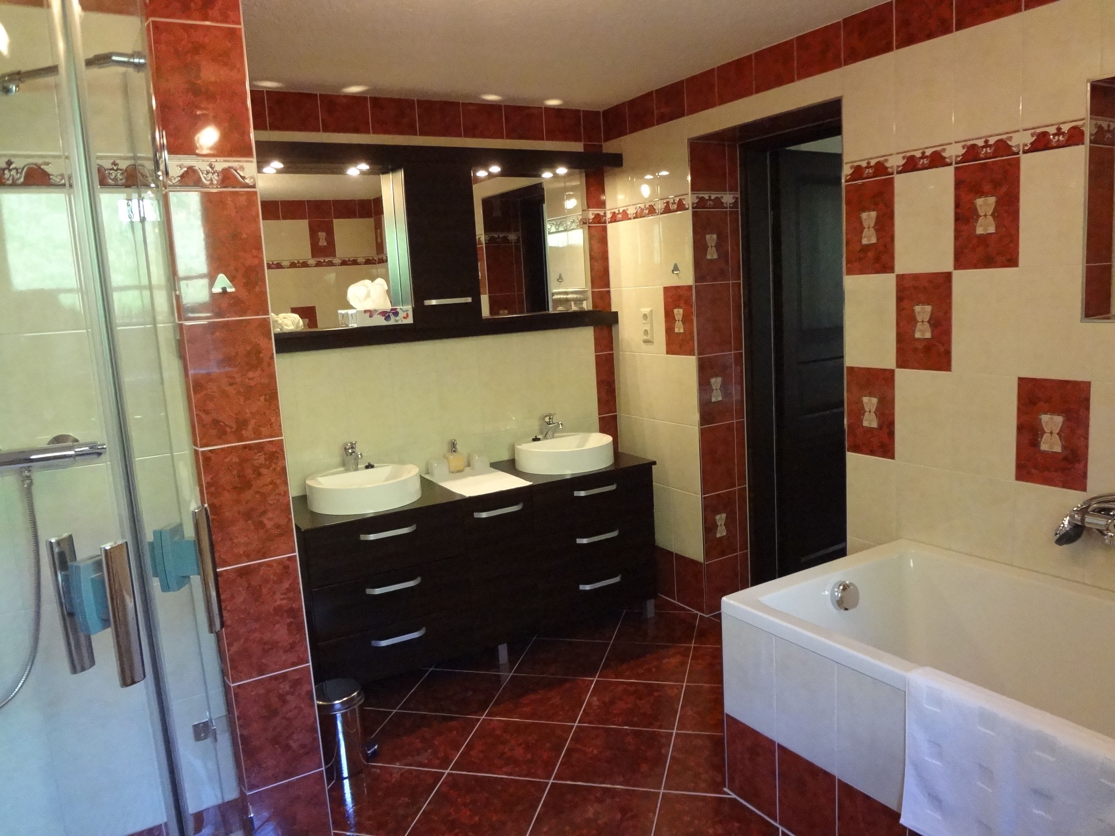 separate bathtub and shower, deep-soaking bathtub, hair dryer, slippers