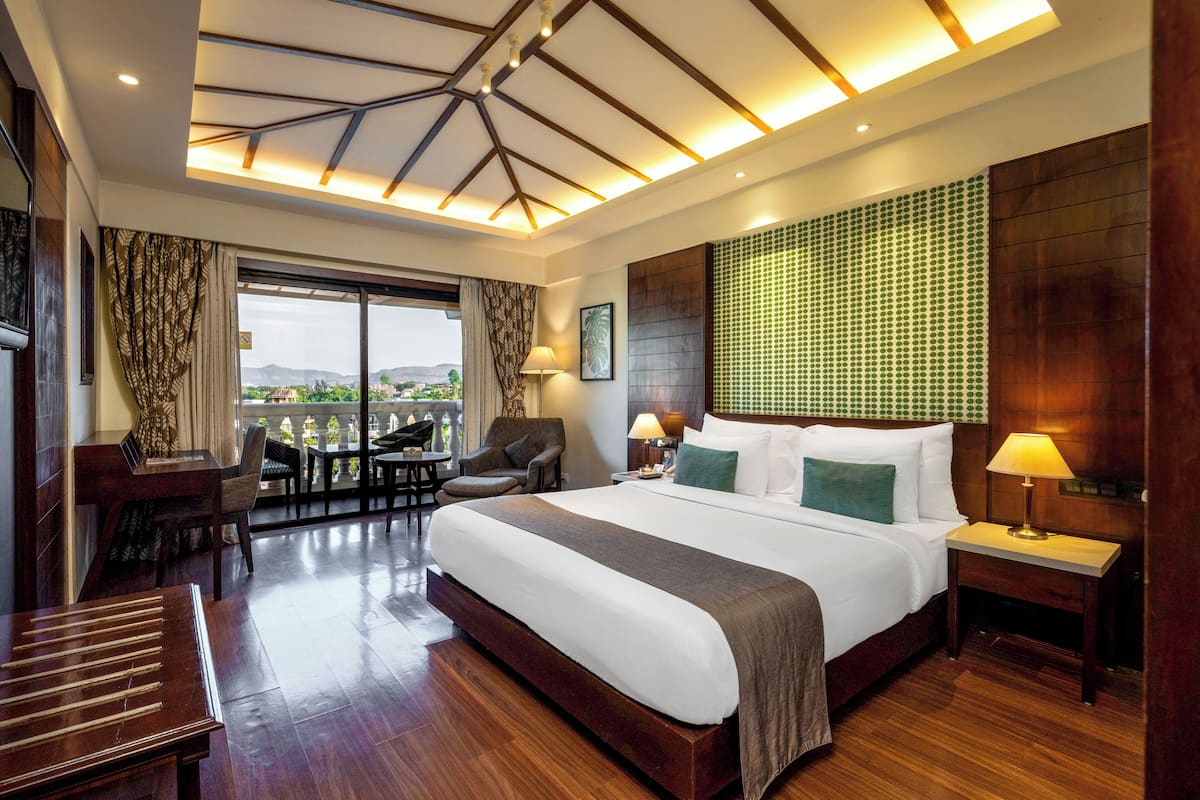 Executive Room | 1 bedroom, minibar, in-room safe, individually furnished