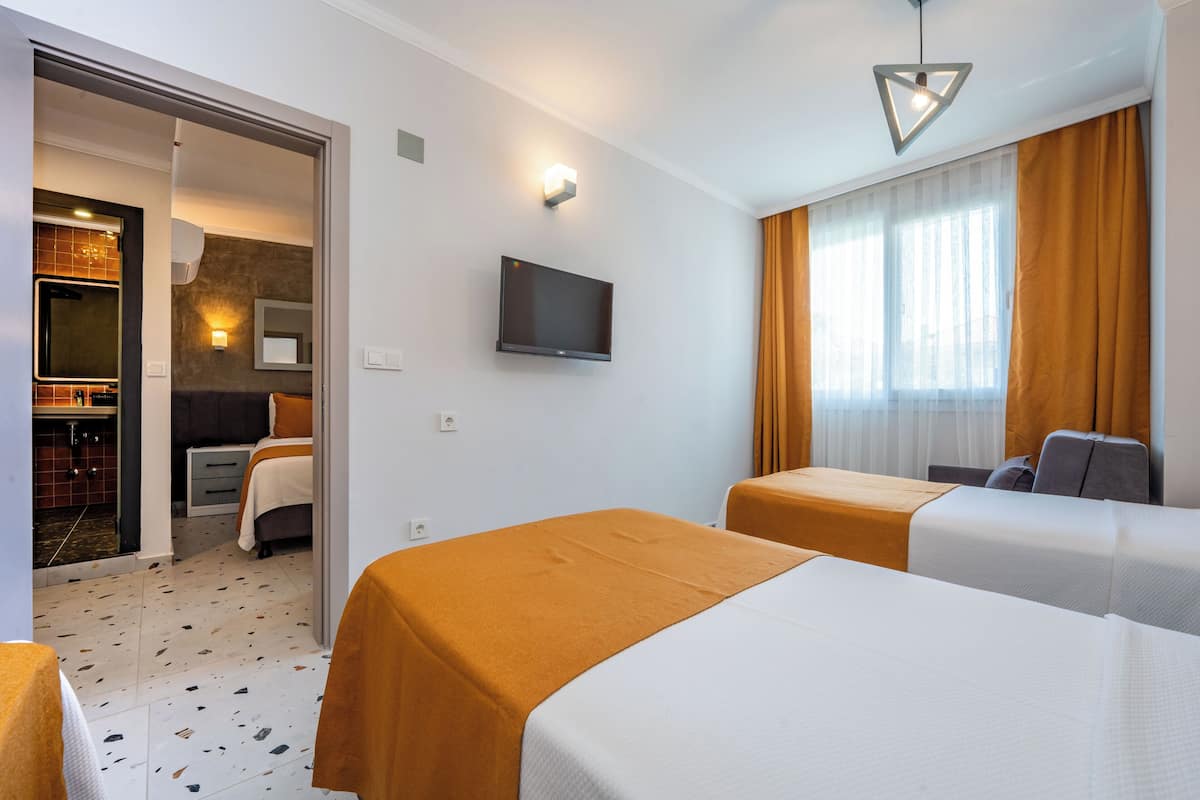 Executive Family Room | Free minibar items, in-room safe, free WiFi, bed sheets