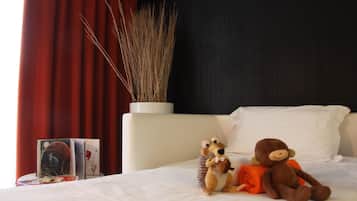 Family Room, Multiple Beds | 1 bedroom, premium bedding, down comforters, minibar