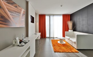 Suíte, 1 cama King | Roupas de cama premium, edredons de pluma, frigobar, cofres nos quartos