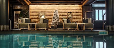 Indoor pool, open 9 AM to 8 PM, pool loungers