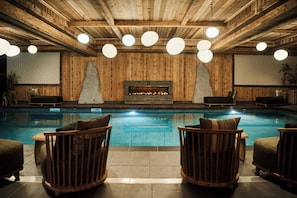 Indoor pool, open 9 AM to 8 PM, pool loungers