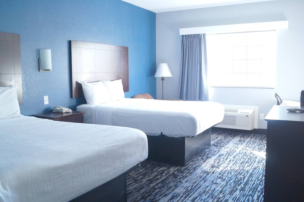 suite, 2 queen beds | frette italian sheets, premium bedding, desk, iron/ironing board