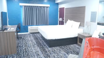 Suite Deluxe, 1 trÚs grand lit, baignoire à jets | 1 chambre, draps italiens Frette, literie de qualité supérieure, bureau
