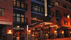 A hotel with a brick facade, multiple balconies, and a prominent entrance with a canopy. - The Oxford Hotel Bend (Bend)