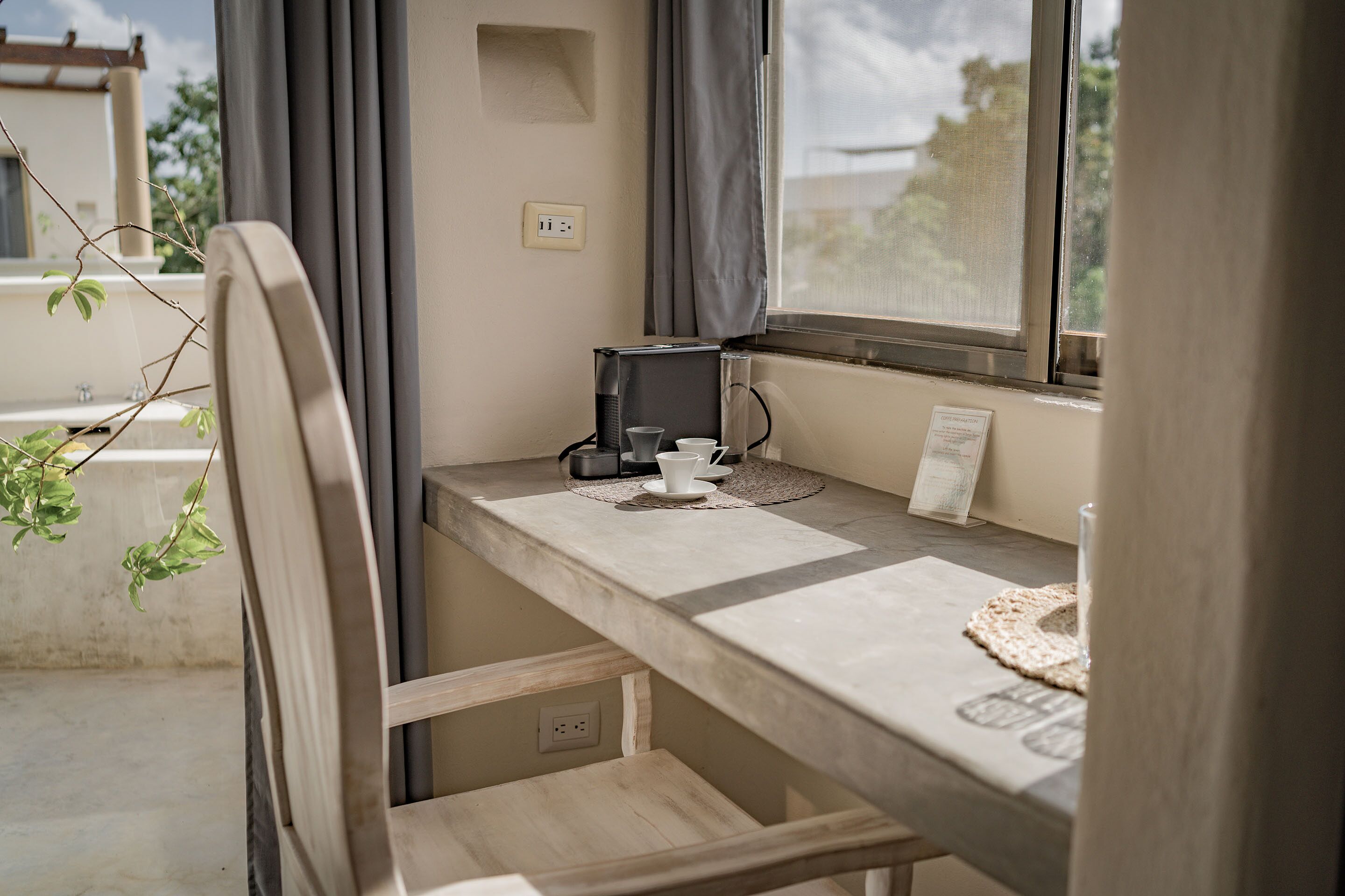 suite with hottub | living area | books