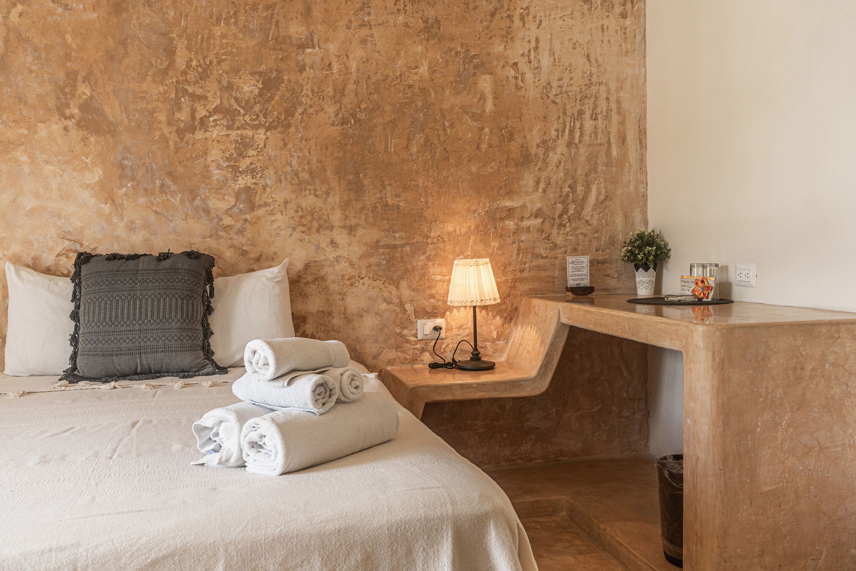 economy room | 1 bedroom, select comfort beds, in-room safe, individually furnished