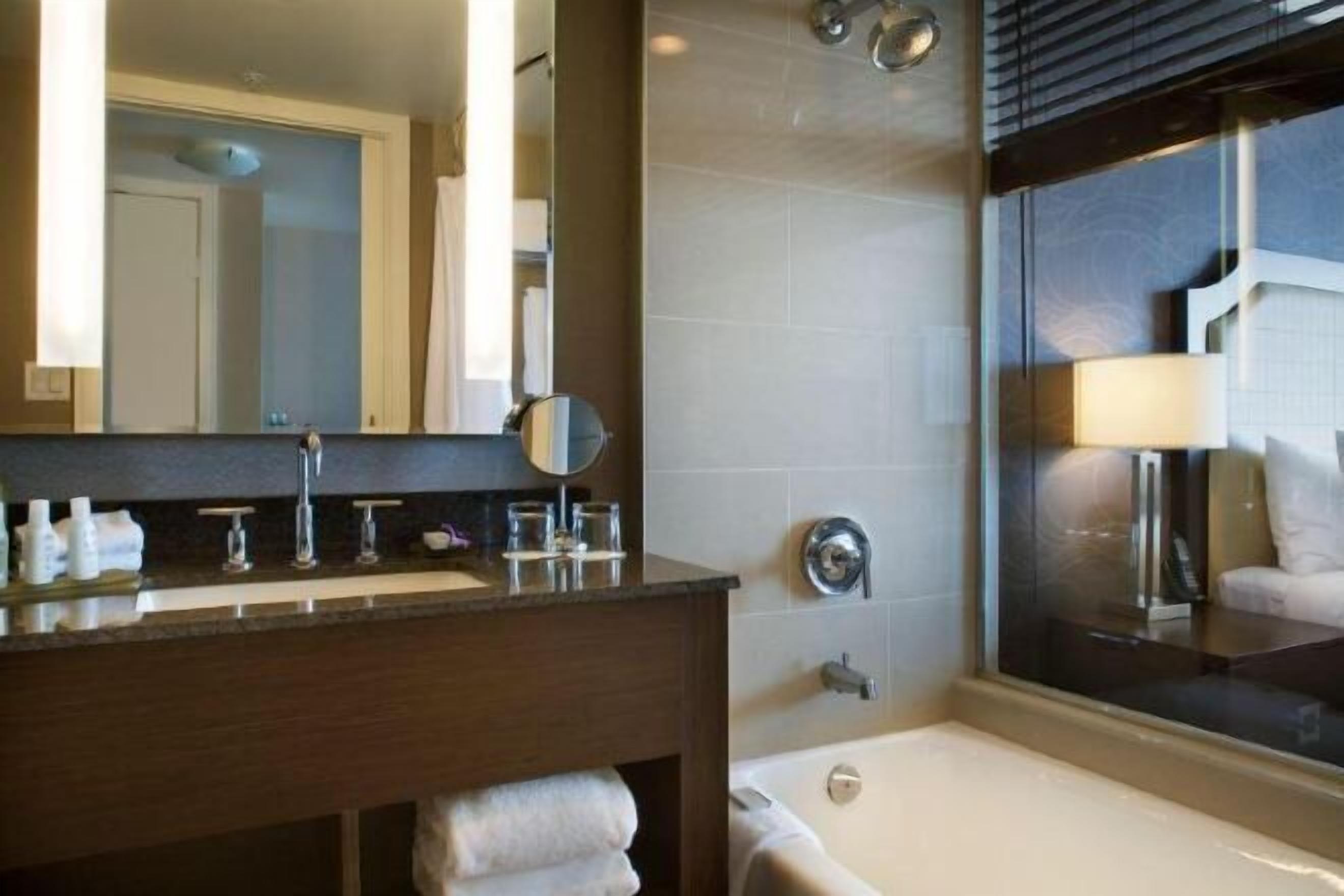Bathroom | Combined shower/tub, designer toiletries, hair dryer, bathrobes