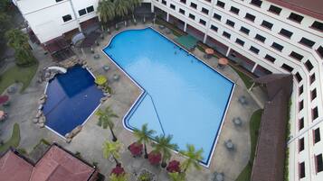 2 outdoor pools, pool umbrellas, pool loungers