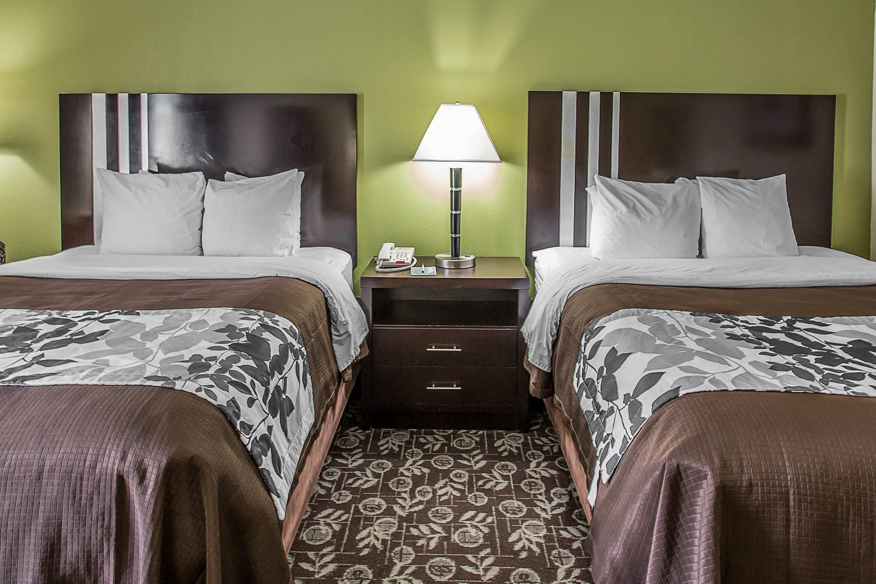 pillow-top beds, desk, laptop workspace, iron/ironing board