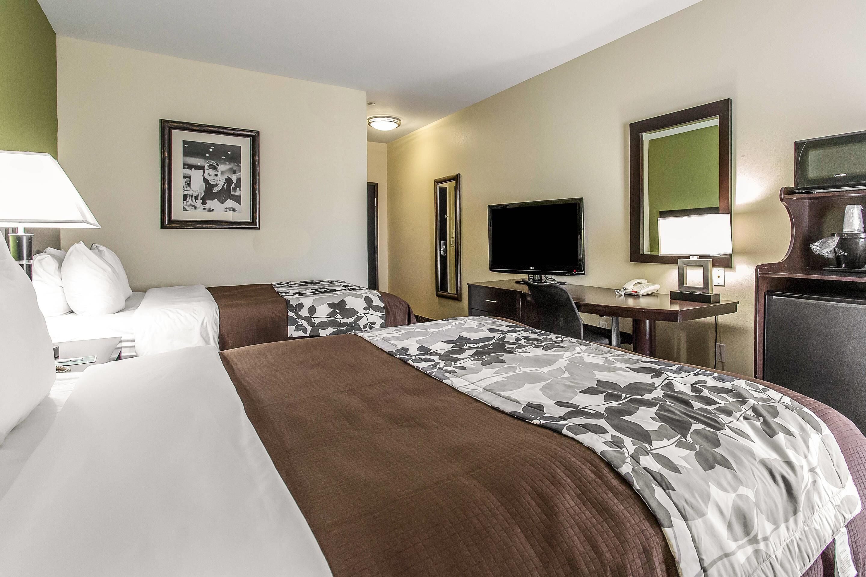 pillow-top beds, desk, laptop workspace, iron/ironing board