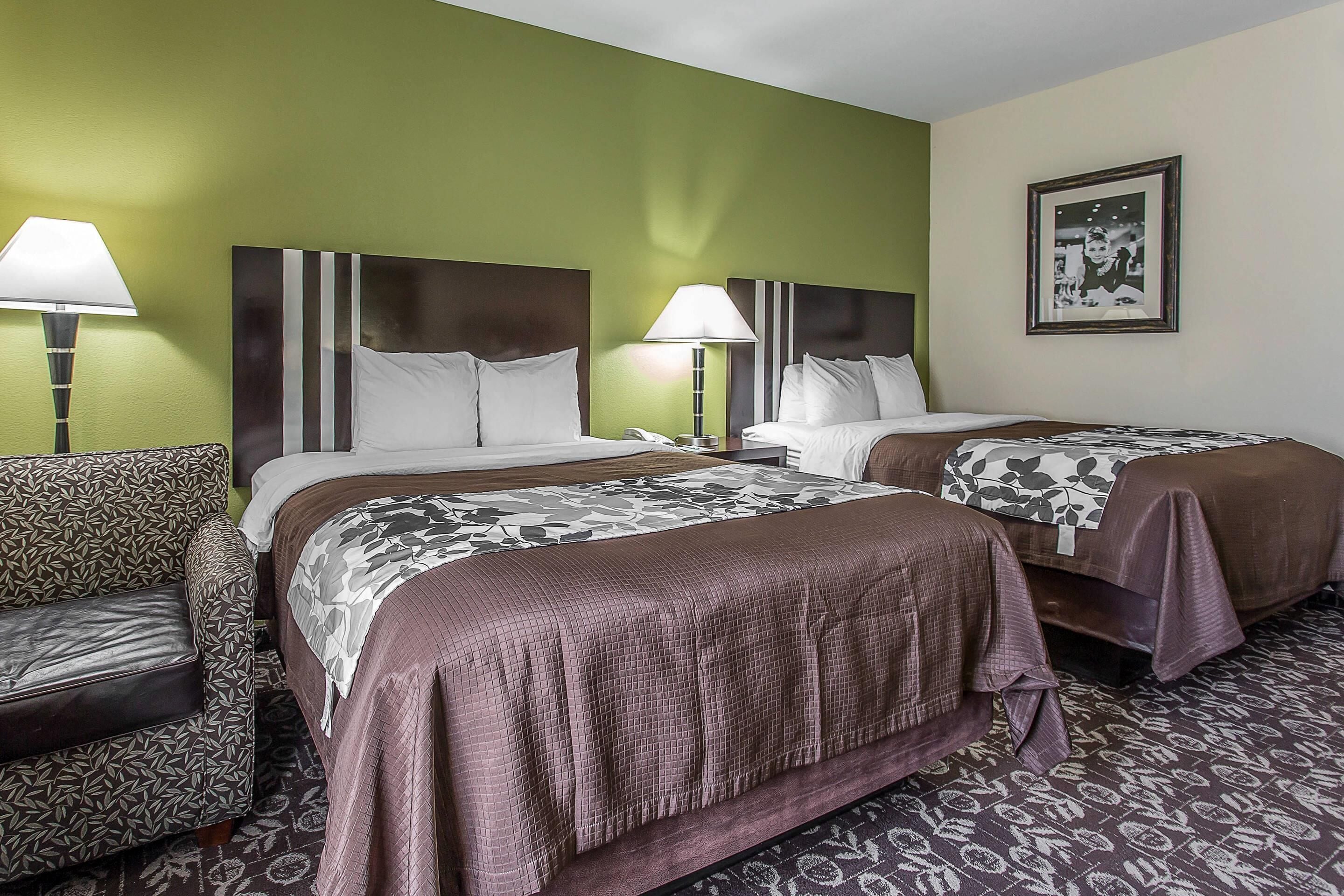 pillow-top beds, desk, laptop workspace, iron/ironing board