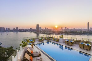 Outdoor pool, open 7:00 AM to 5:00 PM, pool umbrellas, sun loungers - Kempinski Nile Hotel Cairo (Cairo)